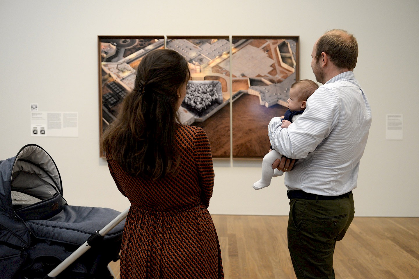Parents with baby at the museum.